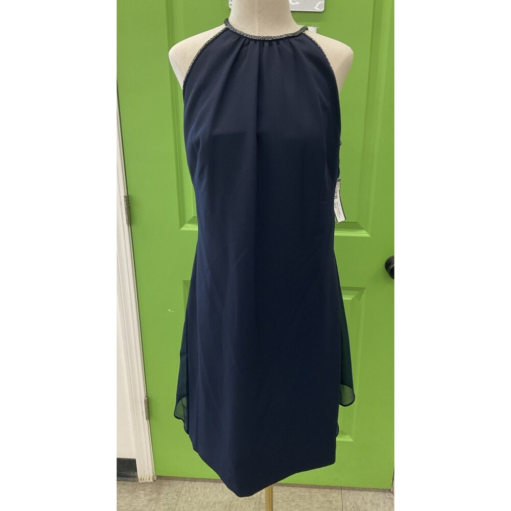 Lauren Navy Dress Size 8 with nylon flyaway accents on back NWT